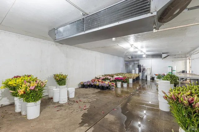 a kitchen with stainless steel appliances granite countertop a sink counter space and cabinets