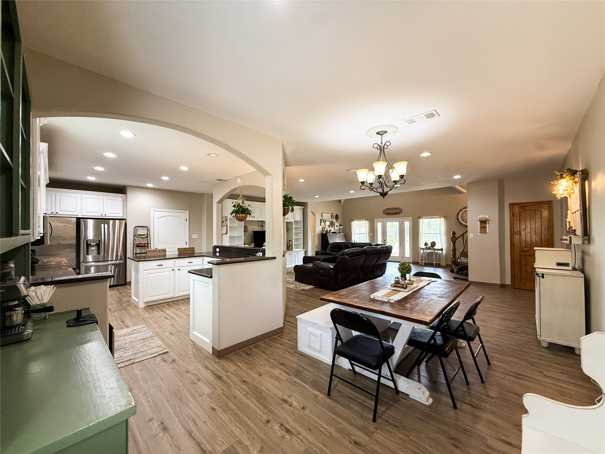 740 Bridget Avenue Buffalo, TX 75831 - Photo 23 of 50 a kitchen with a dining table chairs stove and kitchen view