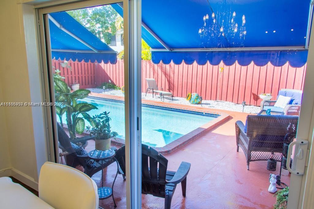 10000 Southwest 147th Court Miami, FL 33196 - Photo 14 of 36 a room with furniture and a window