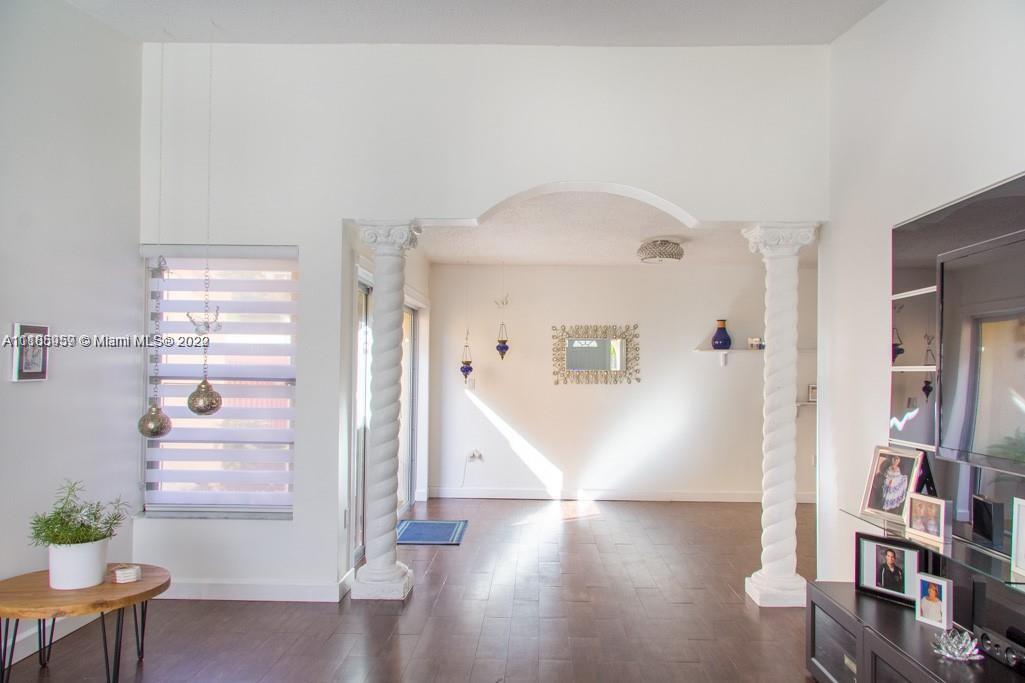 10000 Southwest 147th Court Miami, FL 33196 - Photo 2 of 36 a view of livingroom with furniture and wooden floor