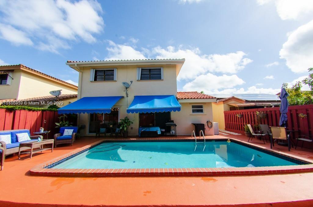10000 Southwest 147th Court Miami, FL 33196 - Photo 30 of 36 a view of a yard with a patio