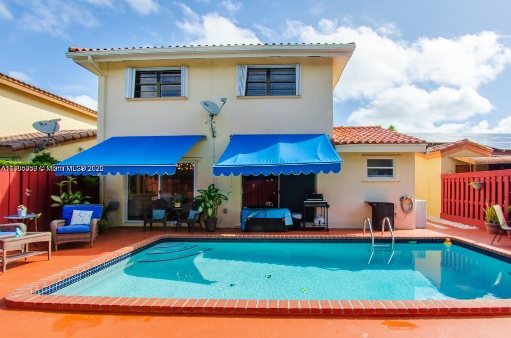 10000 Southwest 147th Court Miami, FL 33196 - Photo 32 of 36 a view of outdoor space yard deck patio and fire pit