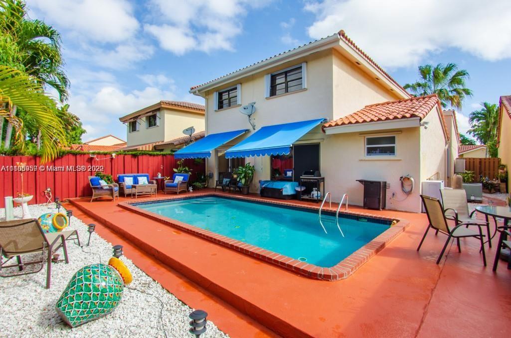 10000 Southwest 147th Court Miami, FL 33196 - Photo 33 of 36 a view of a house with swimming pool and sitting area