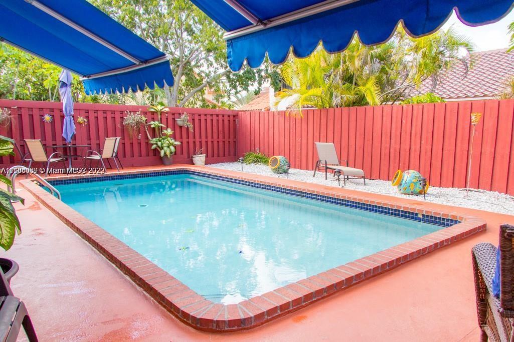 10000 Southwest 147th Court Miami, FL 33196 - Photo 34 of 36 a view of a pool with a yard