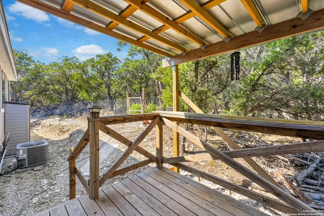 a view of swimming pool with seating area