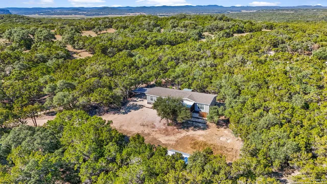 a view of a yard with an outdoor space