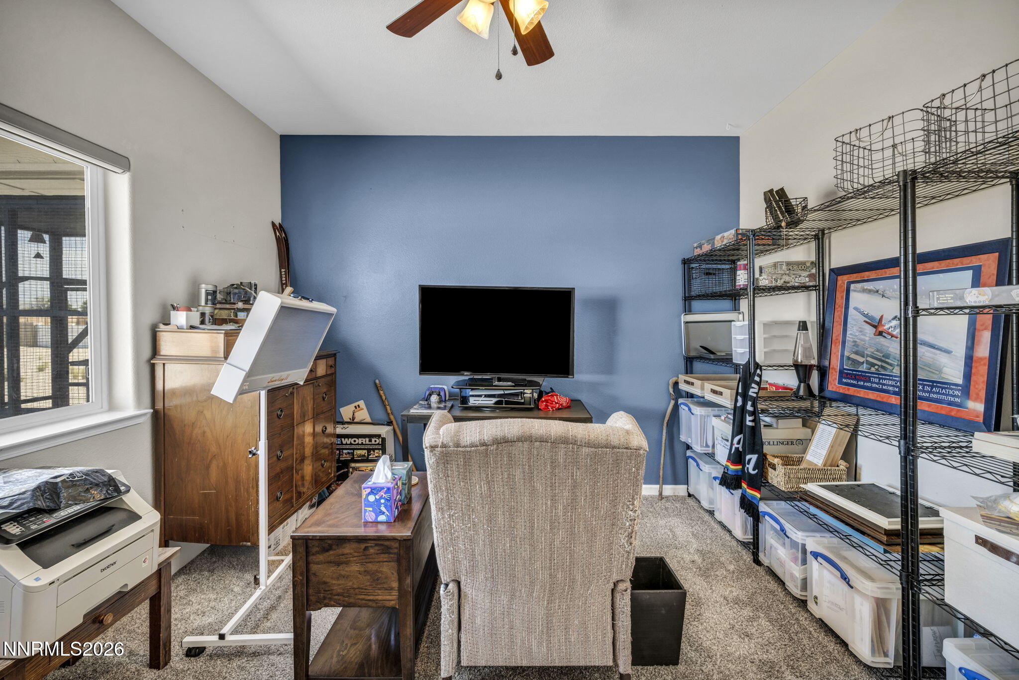 1286 Sky Ridge Drive Fallon, NV 89406 - Photo 37 of 49 a room with furniture and a flat screen tv