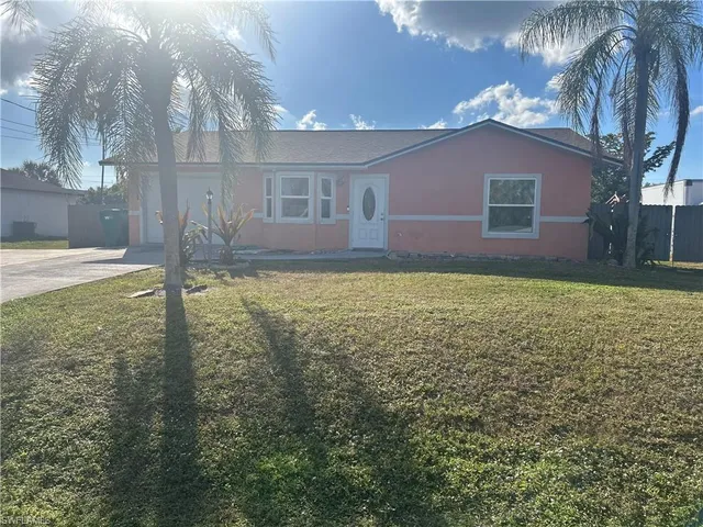 a house view with a garden space