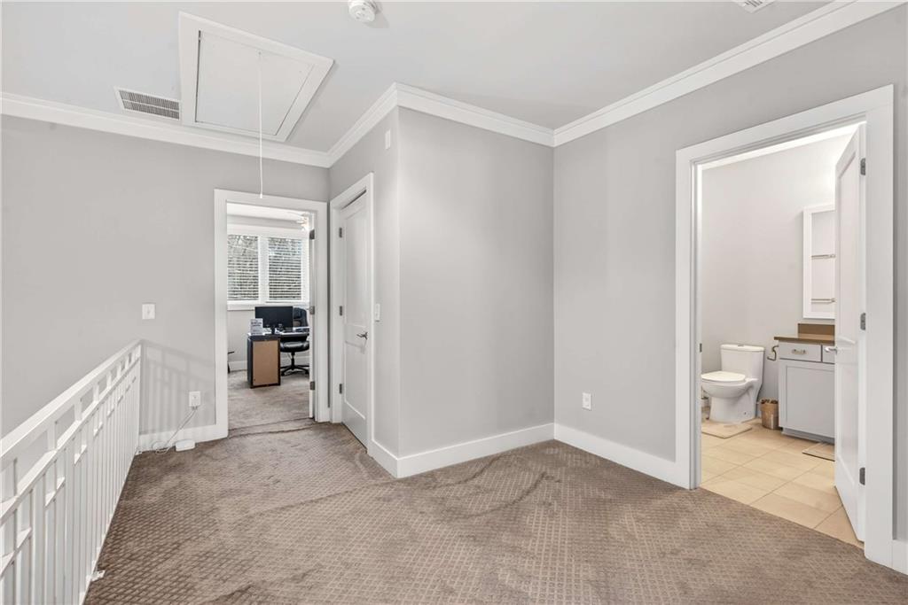 2974 Hermance Drive Northeast Atlanta, GA 30319 - Photo 21 of 38 a view of empty room with a furniture and a window