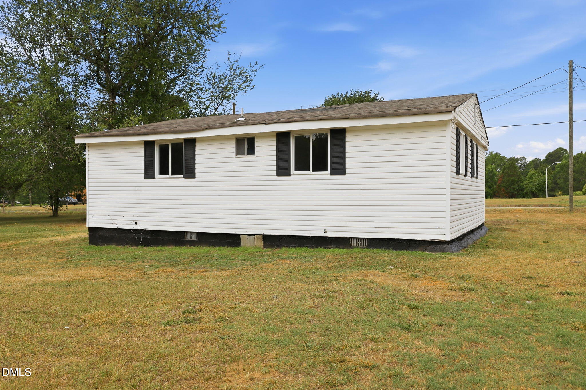 1758 Barber Mill Road Clayton, NC 27520 - Photo 25 of 41 a view of a house with a backyard