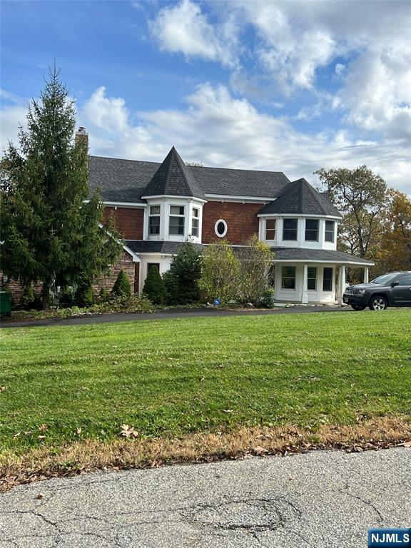 12 Breakneck Road Vernon, NJ 07462 - Photo 13 of 17 a front view of a house with a yard