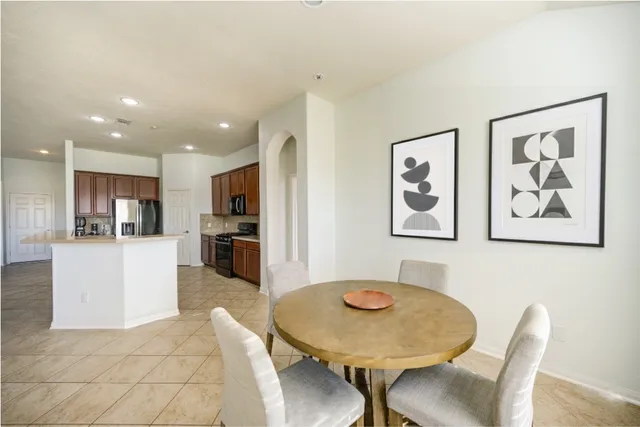 a view of a dining room with furniture
