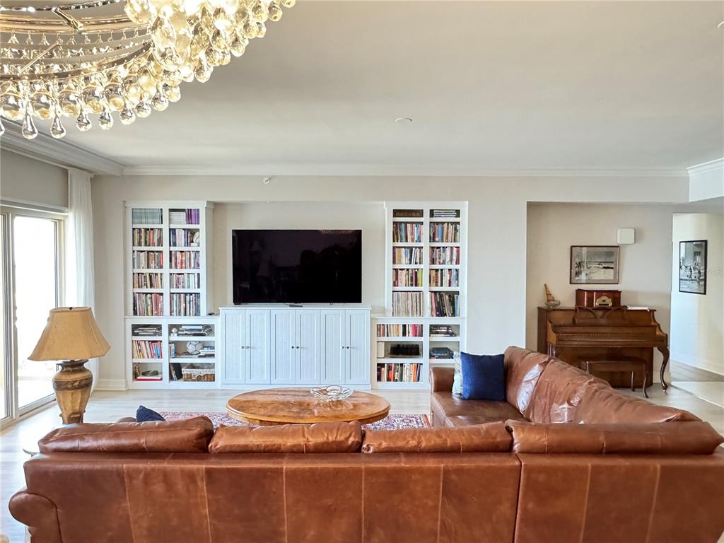 1111 Ritz Carlton Drive, Unit 1404 Sarasota, FL 34236 - Photo 15 of 69 a living room with furniture and a flat screen tv