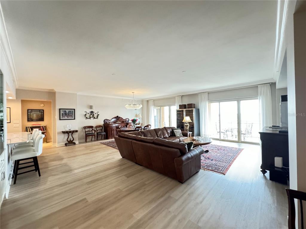 1111 Ritz Carlton Drive, Unit 1404 Sarasota, FL 34236 - Photo 17 of 69 a living room with furniture and a large window