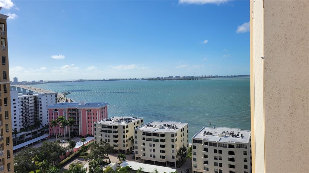 1111 Ritz Carlton Drive, Unit 1404 Sarasota, FL 34236 - Photo 20 of 69 a view of a balcony with an ocean view