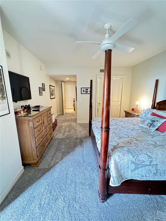 1111 Ritz Carlton Drive, Unit 1404 Sarasota, FL 34236 - Photo 40 of 69 a living room with furniture and a flat screen tv