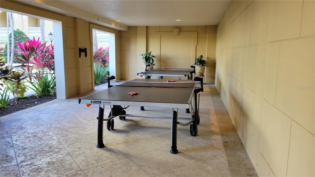 1111 Ritz Carlton Drive, Unit 1404 Sarasota, FL 34236 - Photo 57 of 69 a view of a livingroom with furniture and a potted plant
