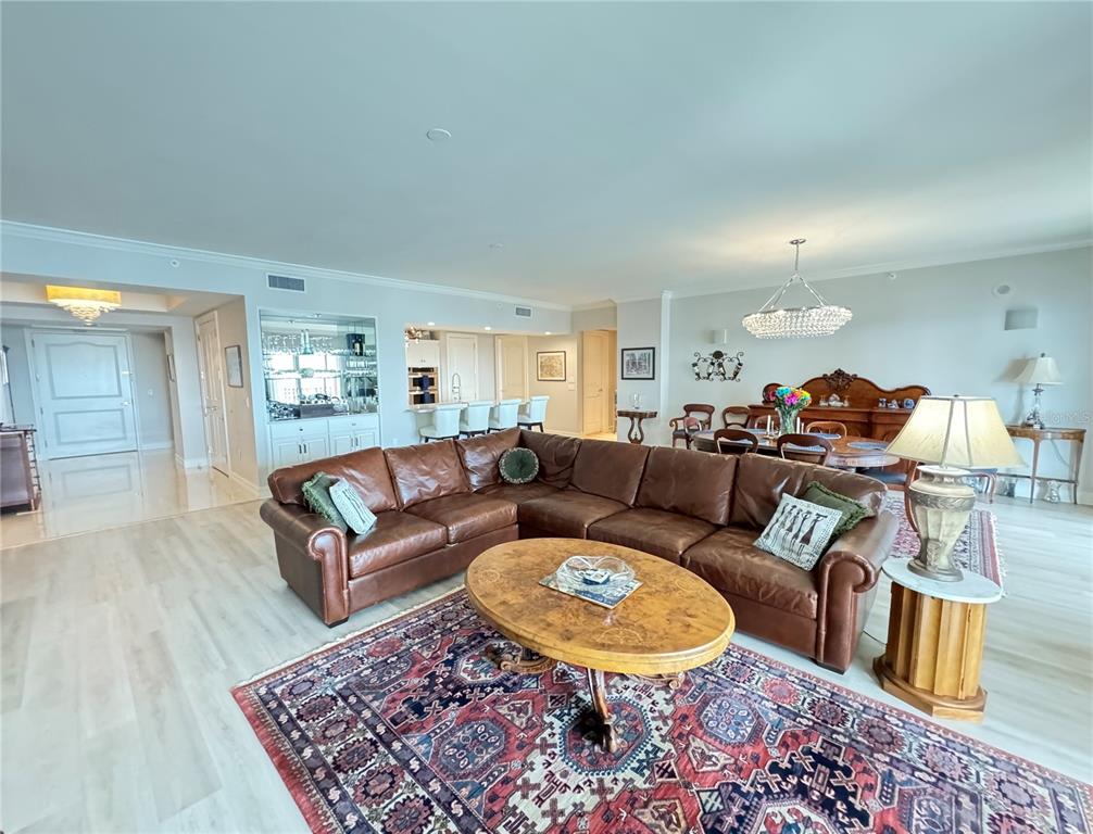 1111 Ritz Carlton Drive, Unit 1404 Sarasota, FL 34236 - Photo 10 of 69 a living room with furniture and a rug