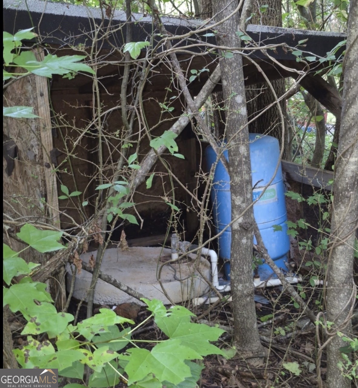100-152 Winding Lane Locust Grove, GA 30248 - Photo 11 of 12 a backyard of a house with lots of green space