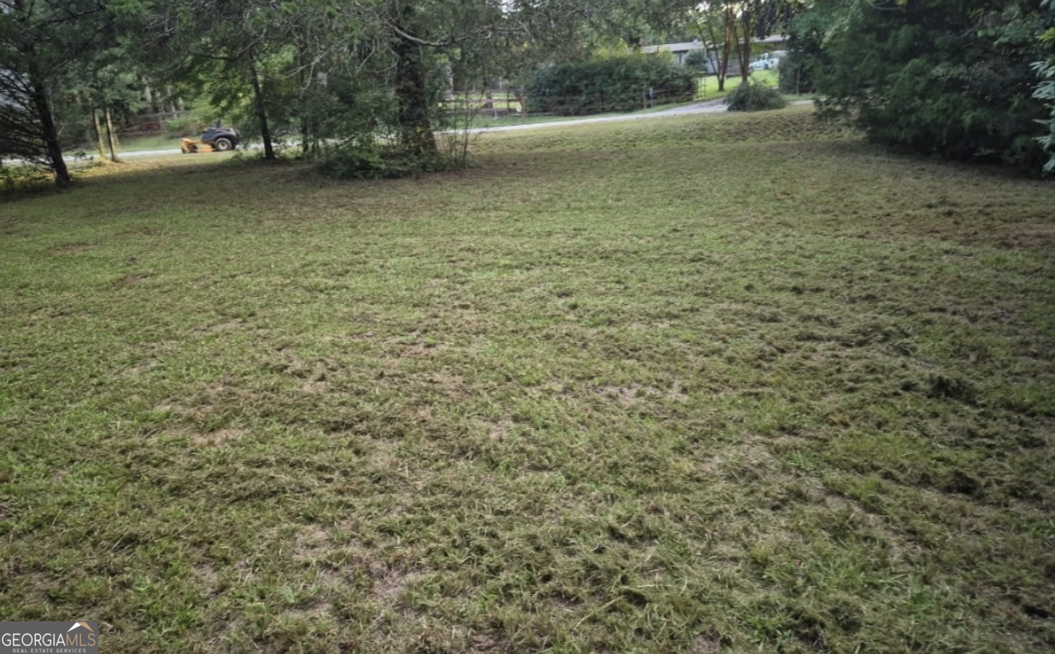 100-152 Winding Lane Locust Grove, GA 30248 - Photo 6 of 12 a view of a yard with a trees