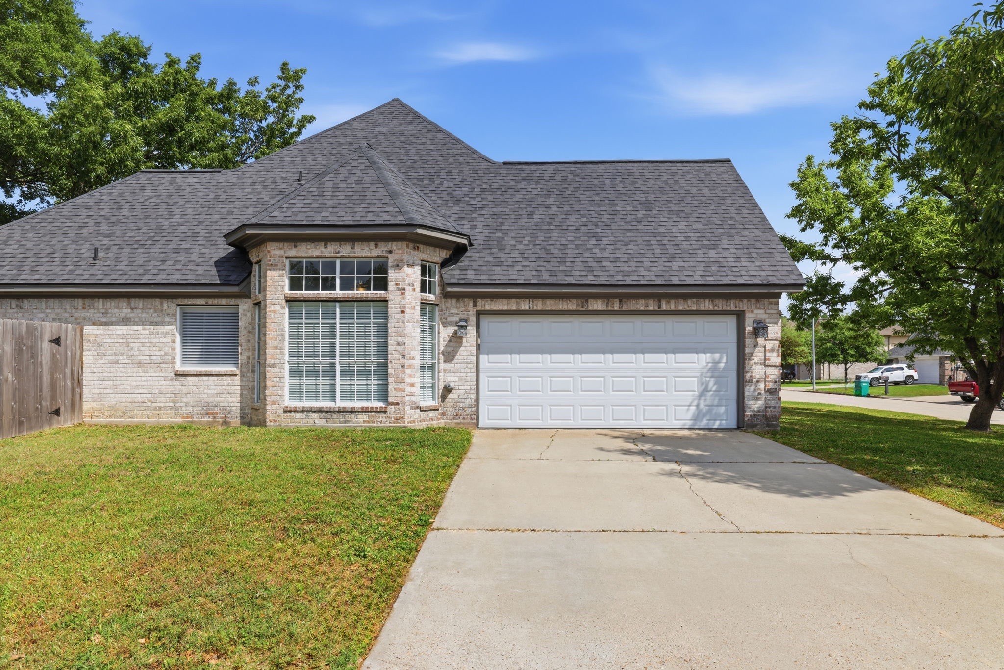 21703 Windsor Castle Drive Spring, TX 77388 - Photo 18 of 20 Double wide private driveway on this beautiful corner lot
