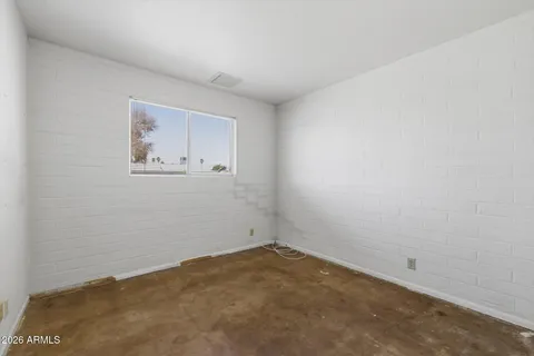 an empty room with a workbench