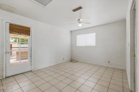 a view of an empty room and window