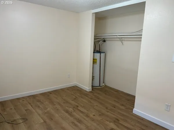 a bathroom with a toilet a sink and a mirror