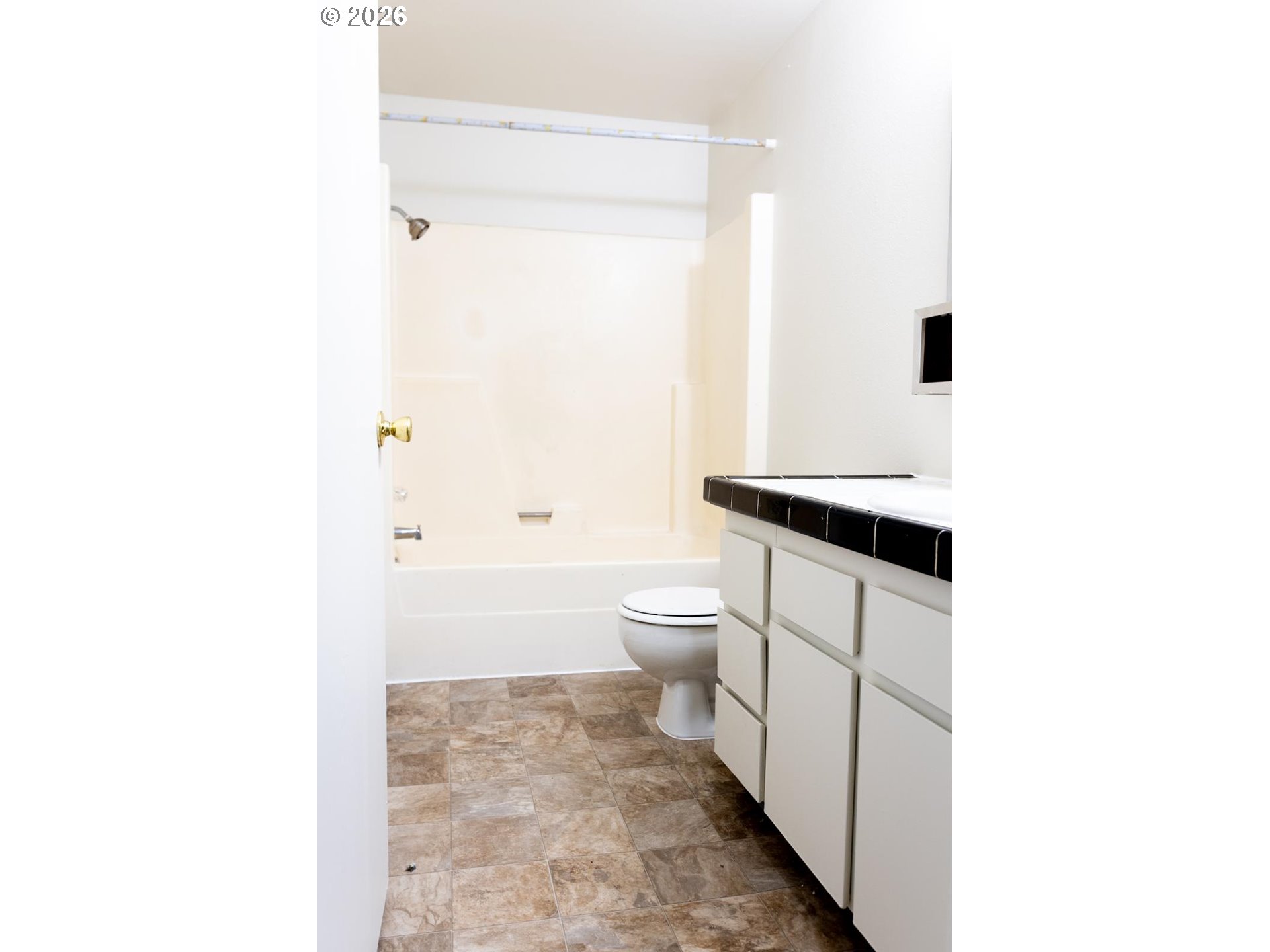 8856 Southeast Jannsen Road Clackamas, OR 97015 - Photo 16 of 28 a bathroom with a toilet a sink and a mirror