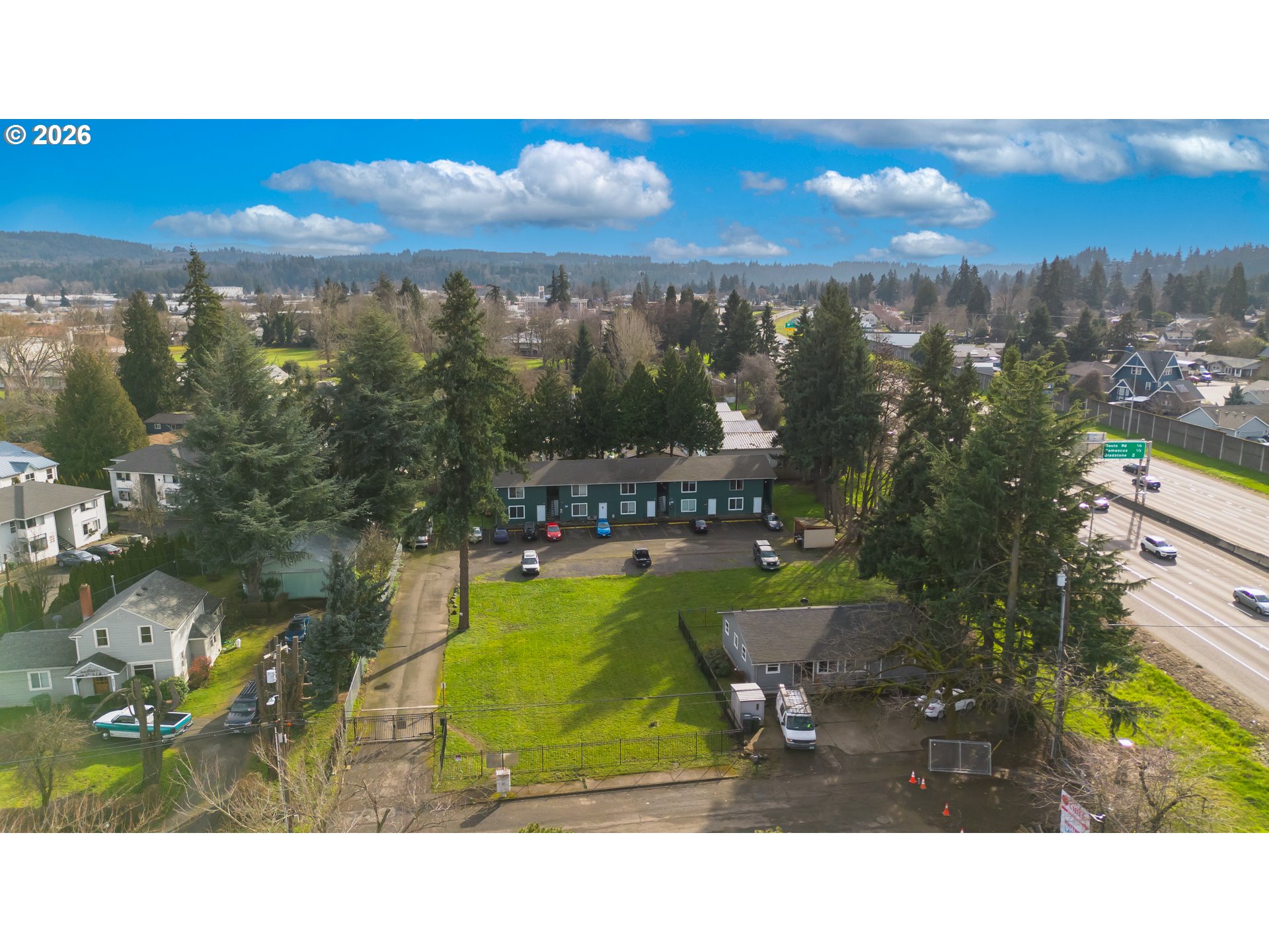 8856 Southeast Jannsen Road Clackamas, OR 97015 - Photo 3 of 28 a balcony with furniture and a view of city
