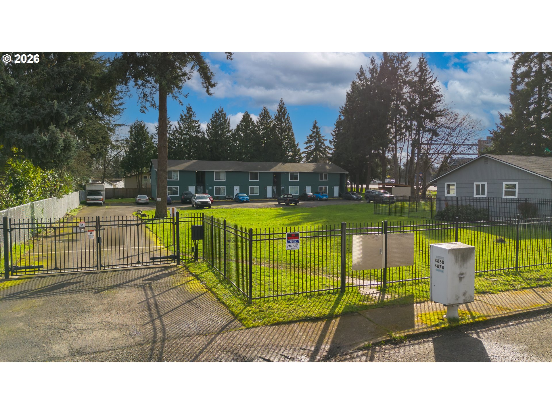 8856 Southeast Jannsen Road Clackamas, OR 97015 - Photo 8 of 28 a view of a swimming pool with a lounge chairs