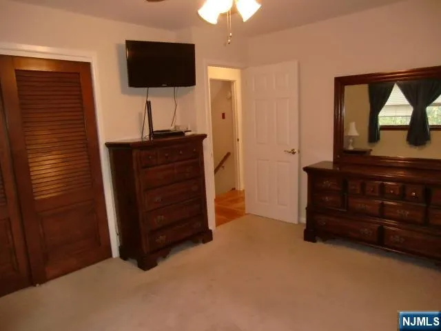 a room with windows and a chandelier