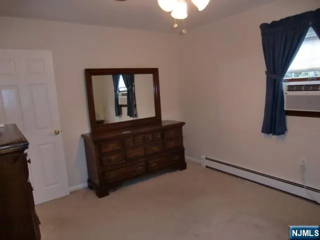wooden floor and window in an empty room