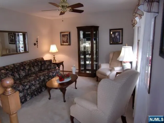 a living room with furniture and window
