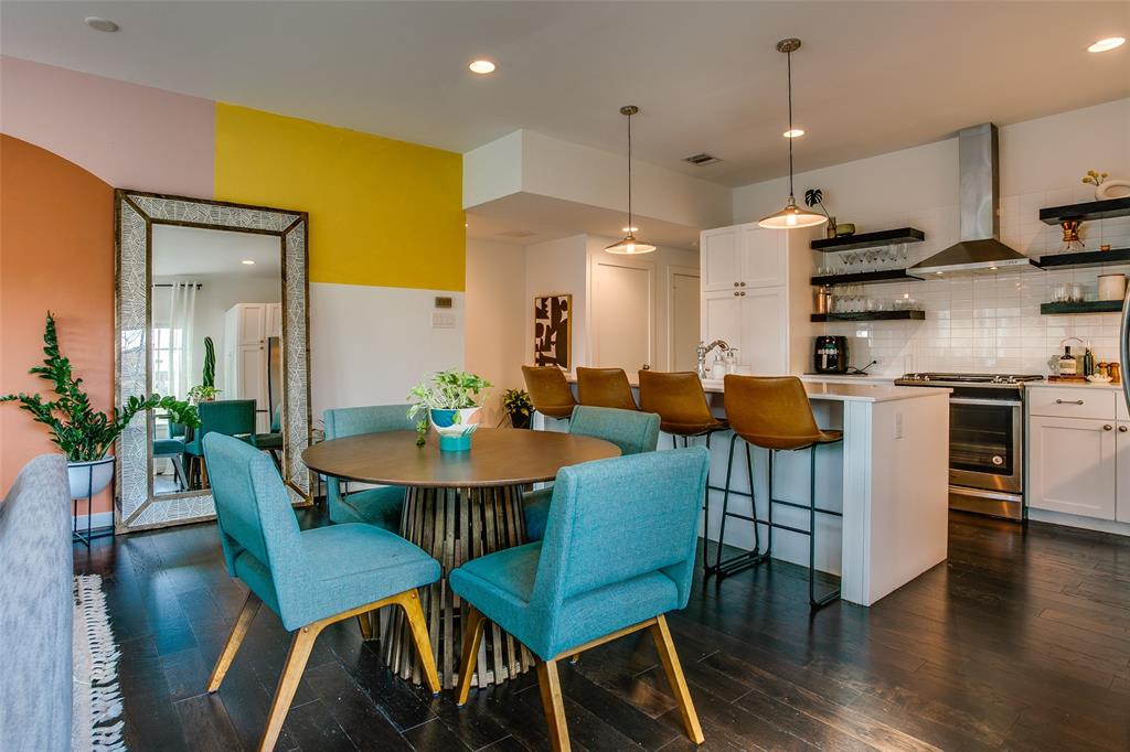 603 Finley Court Dallas, TX 75208 - Photo 13 of 40 a view of a dining room with furniture and wooden floor