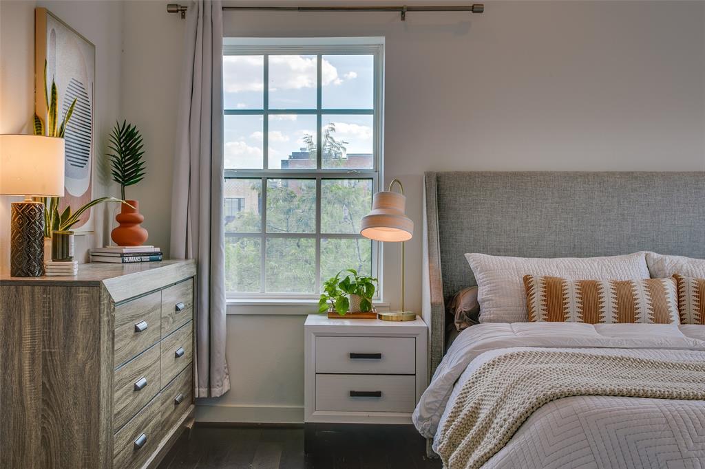 603 Finley Court Dallas, TX 75208 - Photo 28 of 40 a bedroom with a bed and with large windows