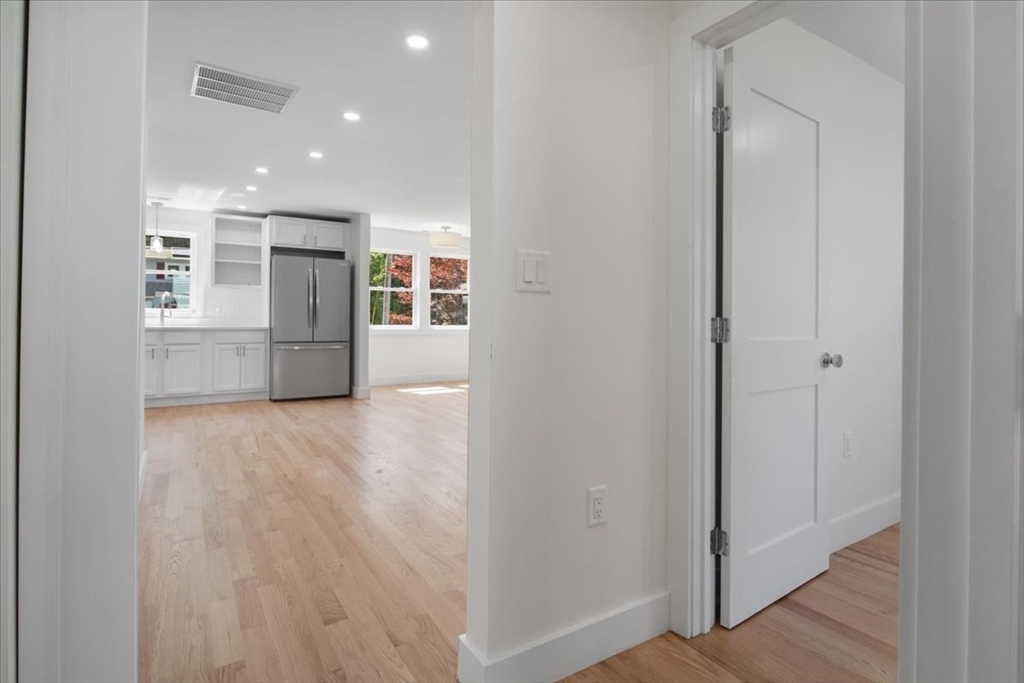 3 Cummings Circle Randolph, MA 02368 - Photo 11 of 39 a view of empty room with wooden floor
