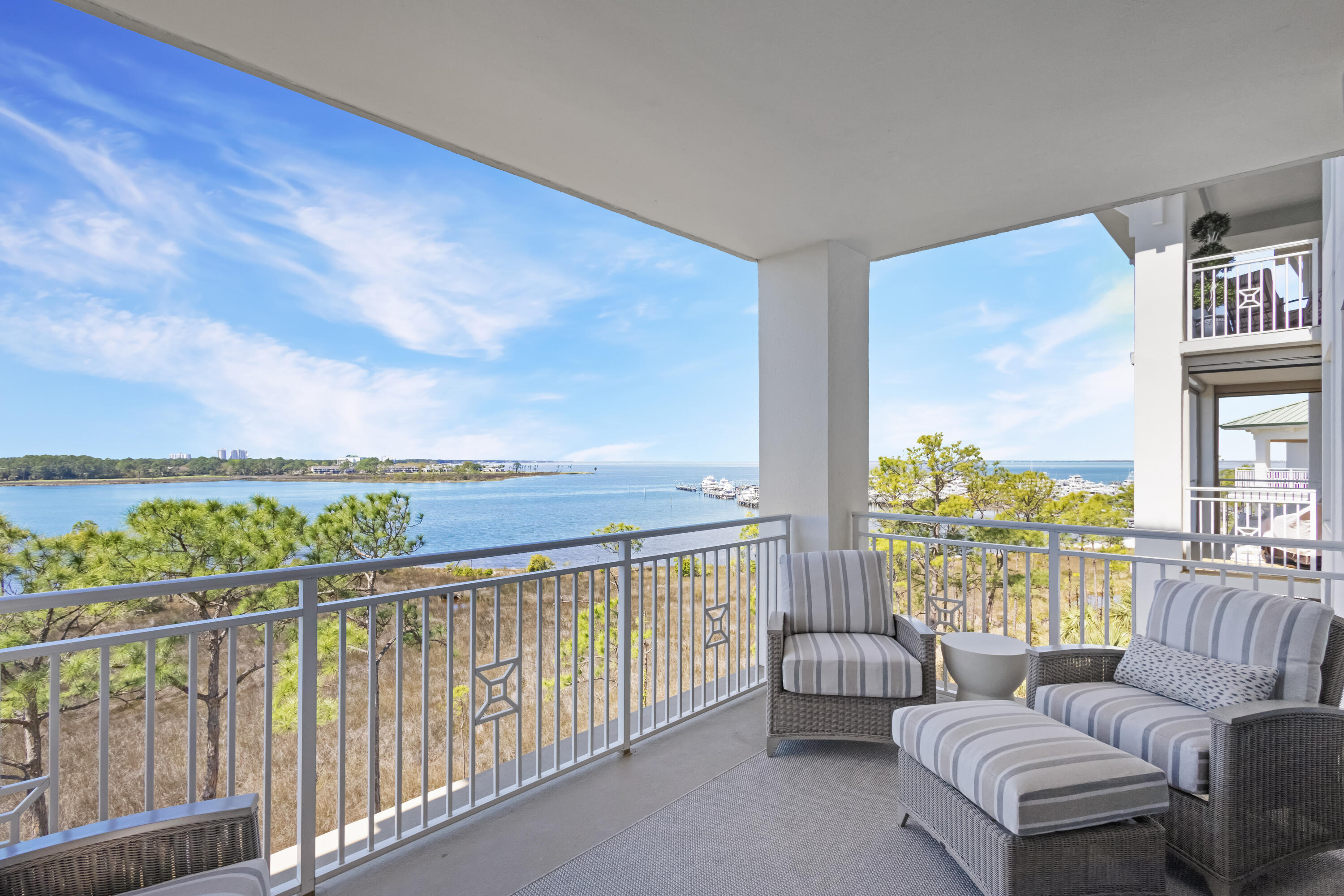 a balcony with furniture and city view