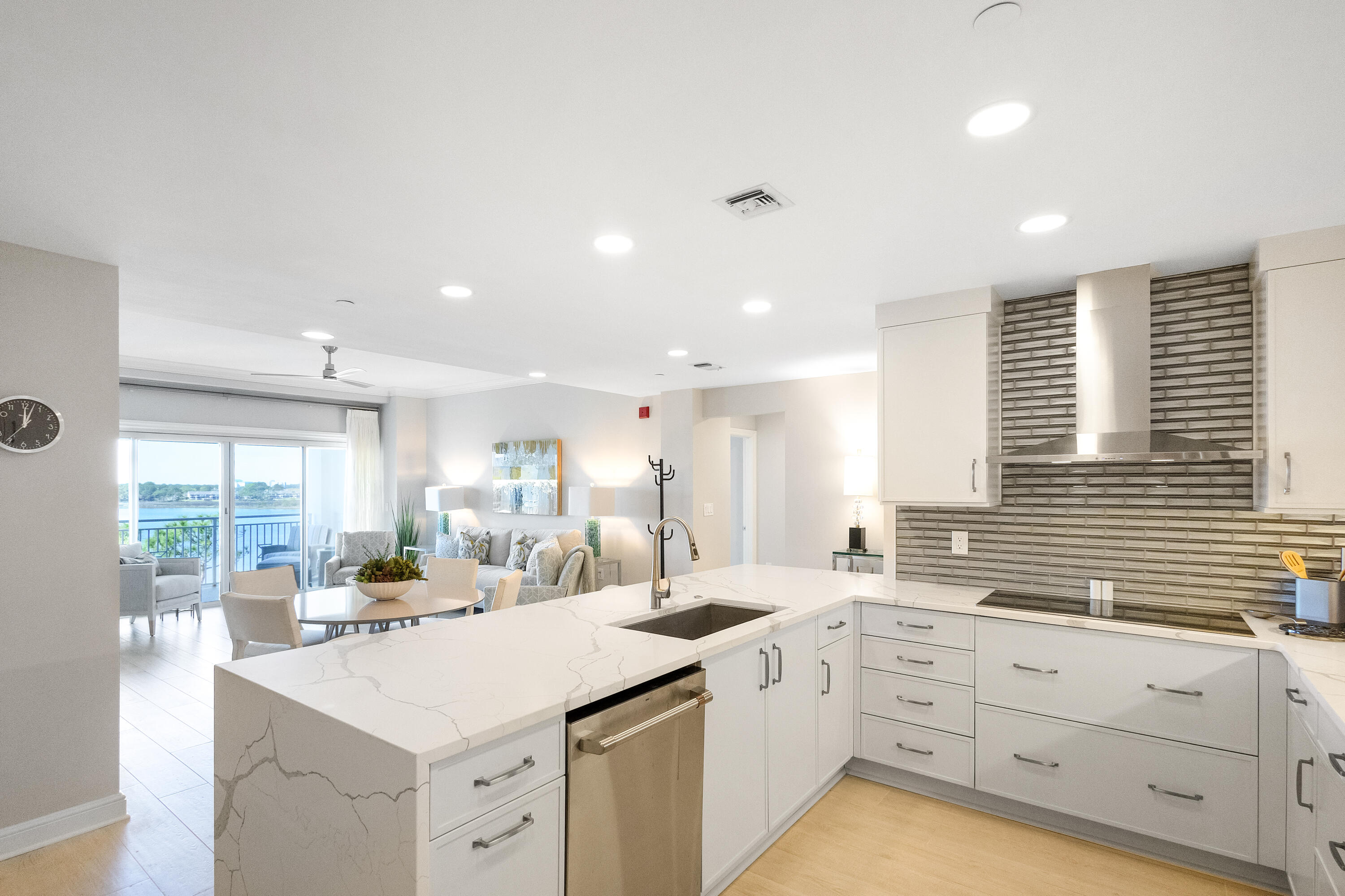 8708 Anchorage Drive Miramar Beach, FL 32550 - Photo 19 of 43 a kitchen with sink stove and cabinets