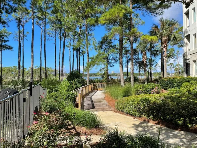 a view of a lake with a building in front of it