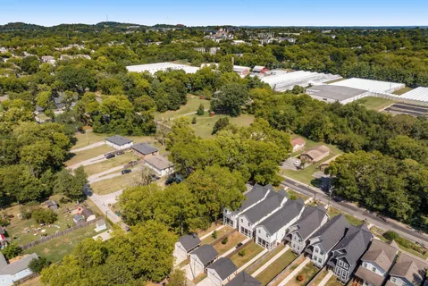 an aerial view of residential building with parking space