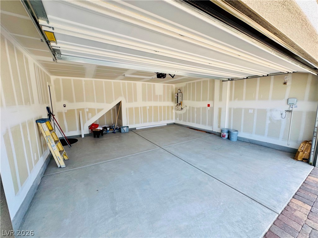9249 Innot Avenue Las Vegas, NV 89148 - Photo 23 of 24 A spacious, newly finished garage offers ample room for parking and storage.