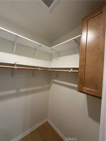 a view of kitchen and kitchen with wooden floor