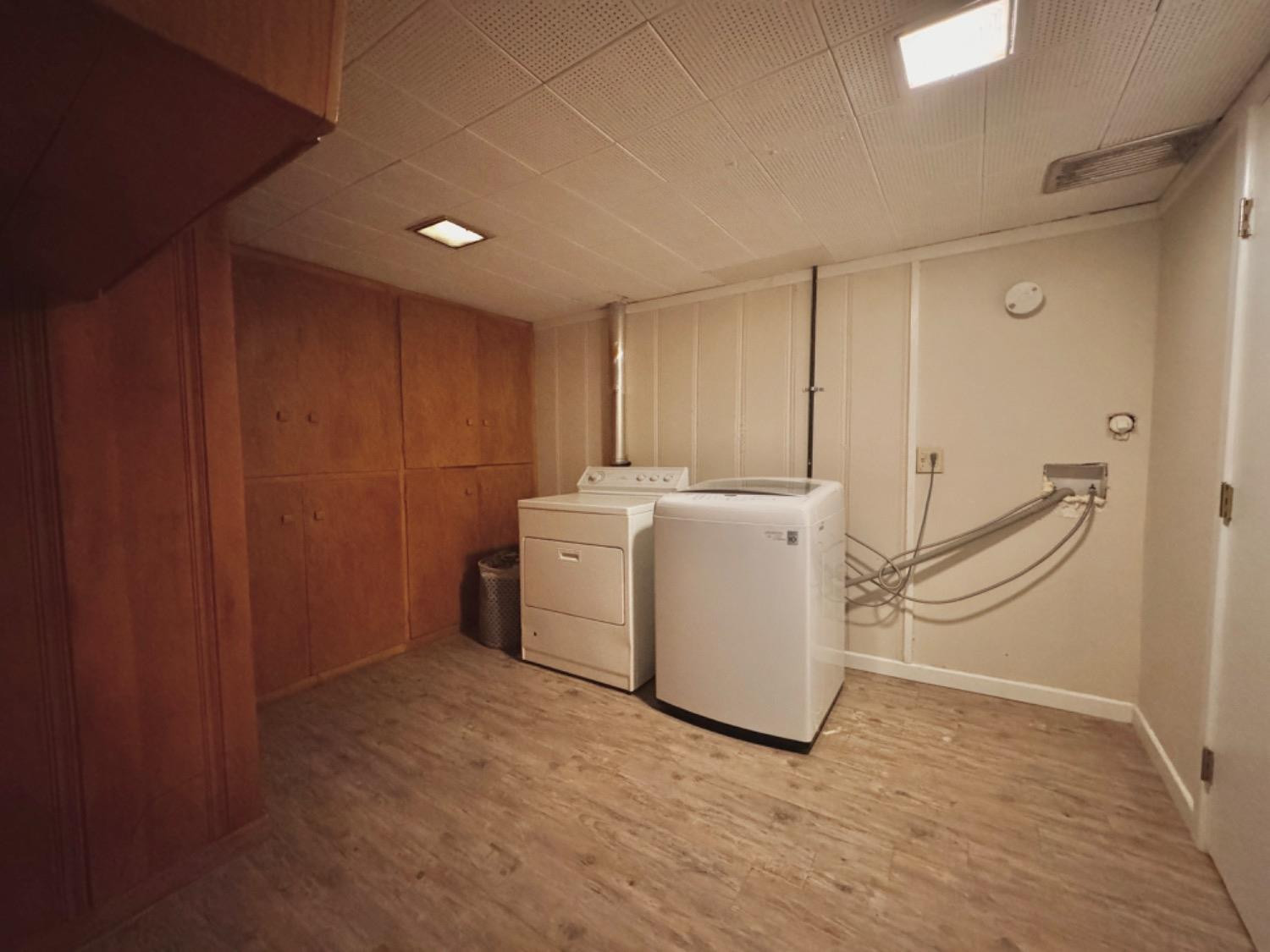 2621 23rd Street Lubbock, TX 79410 - Photo 34 of 38 a utility room with dryer and washer
