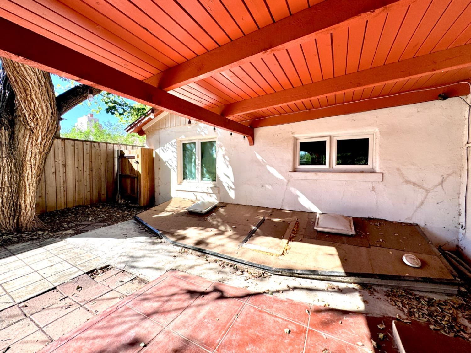 2621 23rd Street Lubbock, TX 79410 - Photo 35 of 38 a backyard of a house with yard and outdoor seating