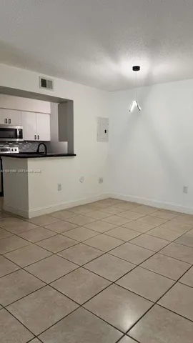 a view of a room with windows