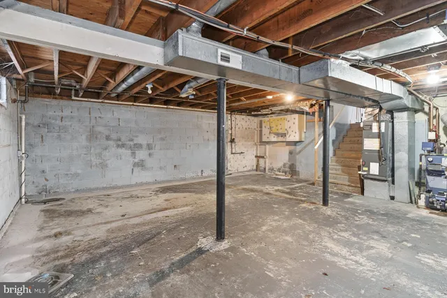 a view of a room with wooden walls