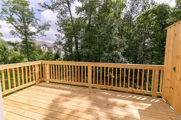 a view of a wooden roof deck