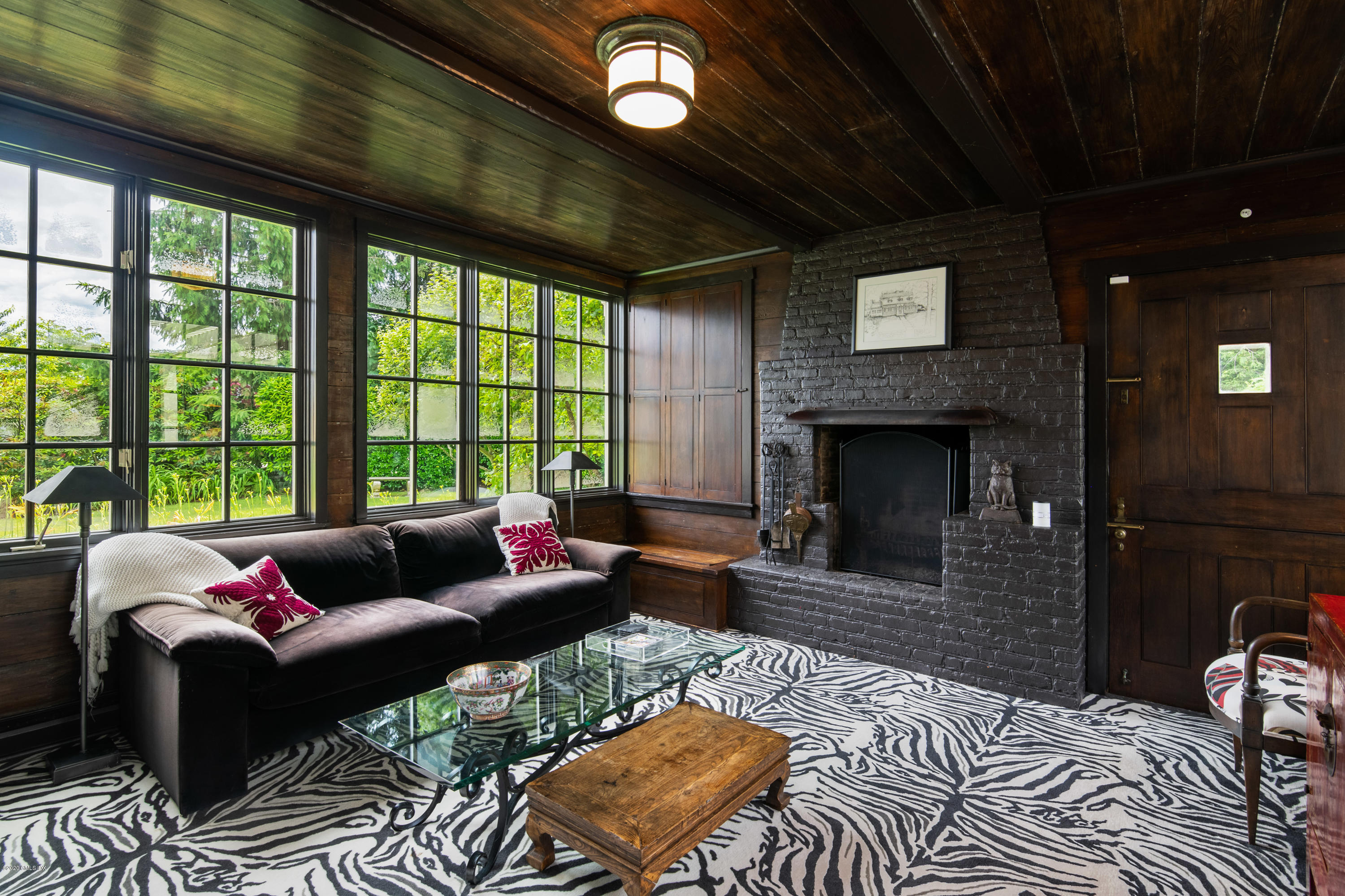 18 Tower Road Riverside, CT 06878 - Photo 11 of 27 a living room with furniture and a fireplace