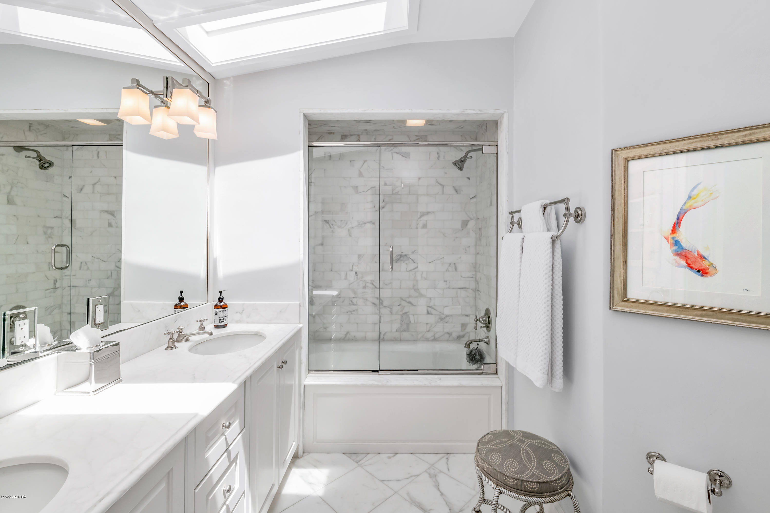 18 Tower Road Riverside, CT 06878 - Photo 13 of 27 a bathroom with a granite countertop sink mirror toilet and bathtub
